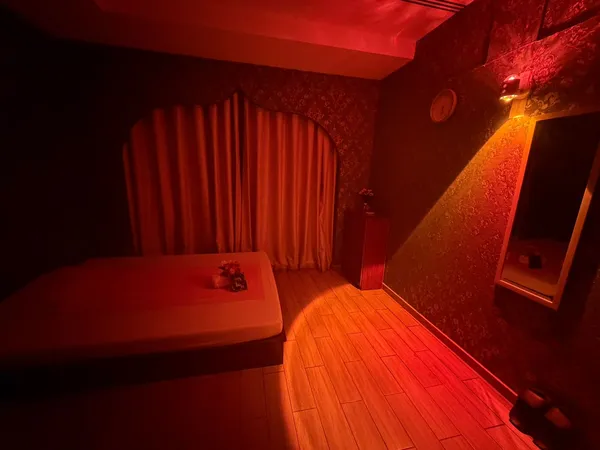 Massage room with warm ambient lighting