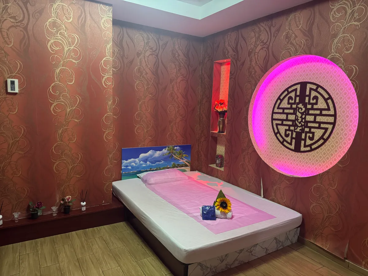 Private treatment room with massage bed at Opaline Spa
